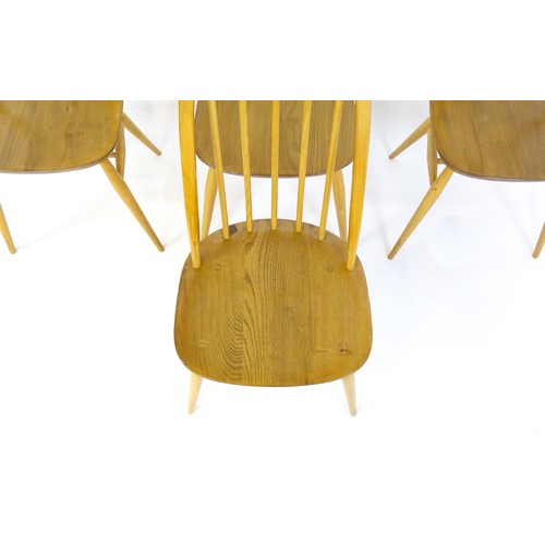 1632 - Vintage / Retro: A set of four Ercol Quaker dining chairs, with a hooped top rail, turned back splat... 