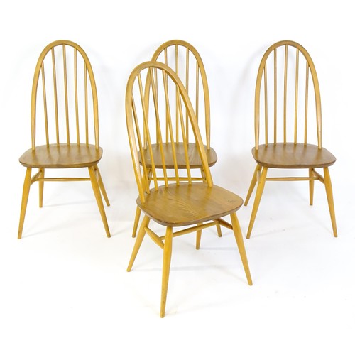 1632 - Vintage / Retro: A set of four Ercol Quaker dining chairs, with a hooped top rail, turned back splat... 