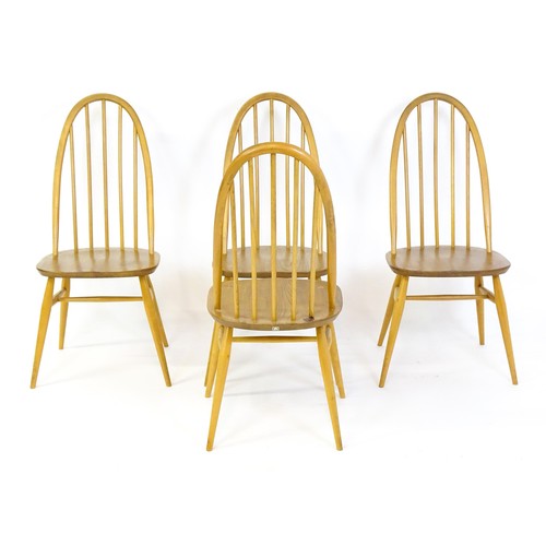 1632 - Vintage / Retro: A set of four Ercol Quaker dining chairs, with a hooped top rail, turned back splat... 