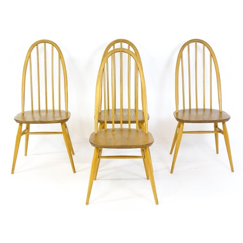 1632 - Vintage / Retro: A set of four Ercol Quaker dining chairs, with a hooped top rail, turned back splat... 