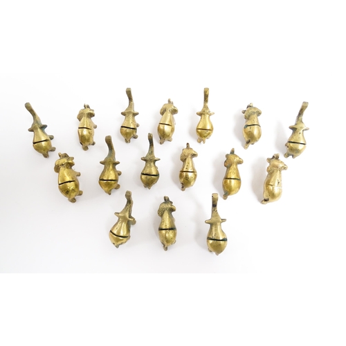 1140 - A quantity of 20thC brass novelty menu / table place card holders of elephant form. Largest approx. ... 