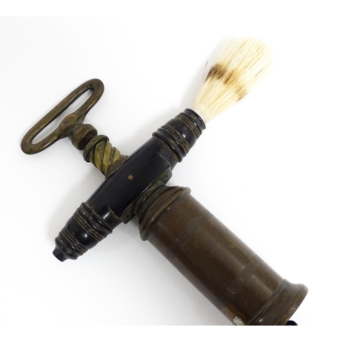 1143 - A 19thC double action corkscrew with bronzed barrel and turned hardwood handle with brush. Approx. 7... 