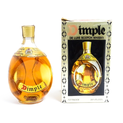 1149 - A late 20thC boxed bottle of Haig Dimple Scotch Whisky (26 2/3 Fl Oz)