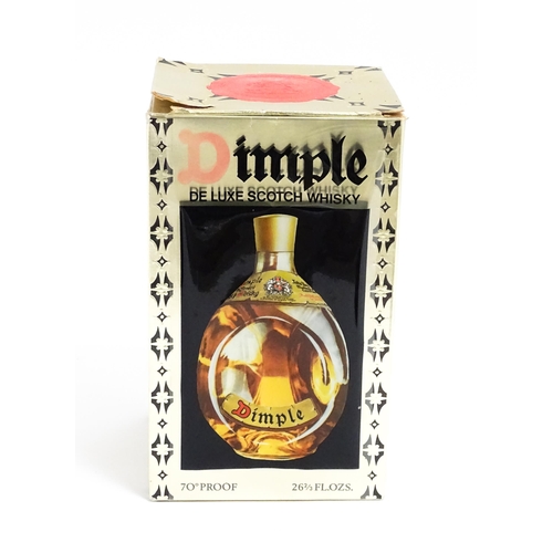 1149 - A late 20thC boxed bottle of Haig Dimple Scotch Whisky (26 2/3 Fl Oz)