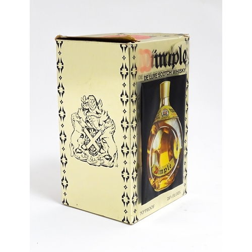 1149 - A late 20thC boxed bottle of Haig Dimple Scotch Whisky (26 2/3 Fl Oz)