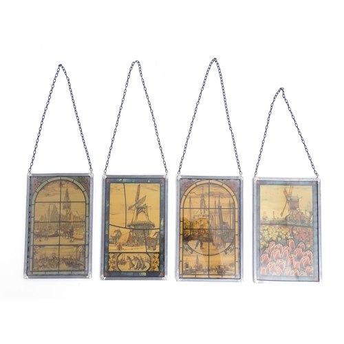 1155 - Four 20thC double glazed stained glass window style prints depicting Dutch scenes, to include tulip ... 