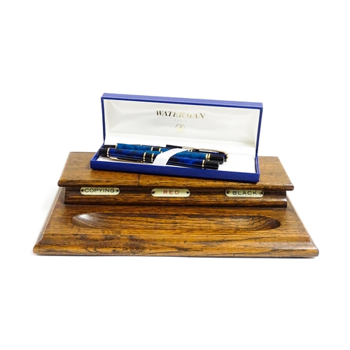 1160 - A cased Waterman fountain pen and ball point pen. Together with another Waterman fountain pen and ba... 