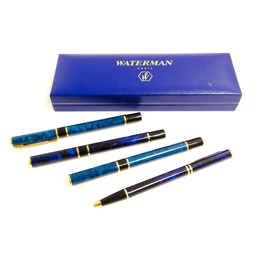 1160 - A cased Waterman fountain pen and ball point pen. Together with another Waterman fountain pen and ba... 