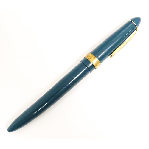 1165 - A 20thC Queensway fountain pen, in teal finish with 22ct gold nib, approx 5 1/2