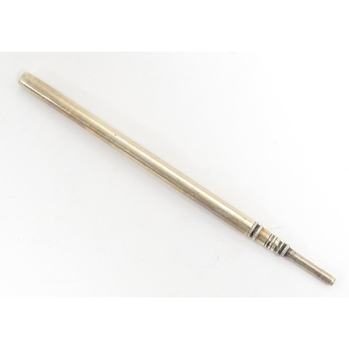 1168 - An early 20thC fountain pen with retractable nib and gilt metal detail. Together with a propelling p... 