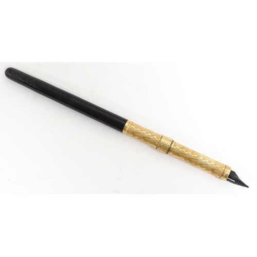 1168 - An early 20thC fountain pen with retractable nib and gilt metal detail. Together with a propelling p... 