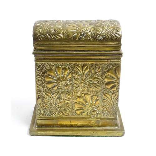 1172 - An early 20thC brass box with domed hinge lid decorated with flowers and foliage. Approx. 5 3/4