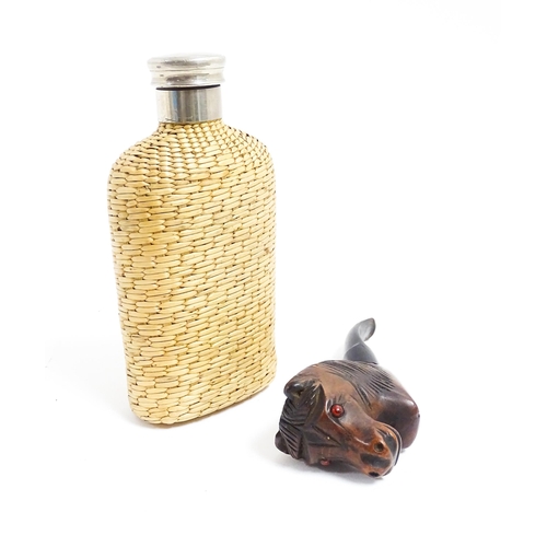 1176 - An early 20thC hip flask with rattan woven cover. Together with a carved novelty tobacco pipe, the b... 