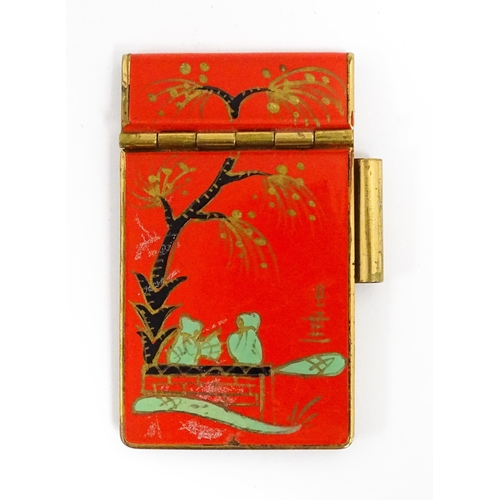 1177 - A Dunhill Rollagas lighter with chequered finish. Together with an Oriental enamelled aide de memoir... 