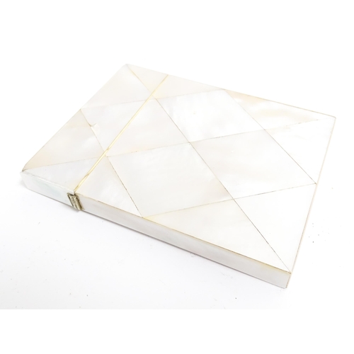 1186 - A Victorian mother of pearl card case of rectangular form. Approx. 4