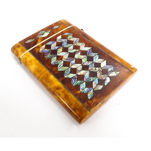 1187 - A Victorian tortoiseshell card case of rectangular form with inlaid abalone geometric decoration. Ap... 