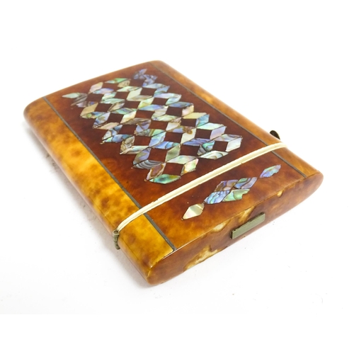 1187 - A Victorian tortoiseshell card case of rectangular form with inlaid abalone geometric decoration. Ap... 