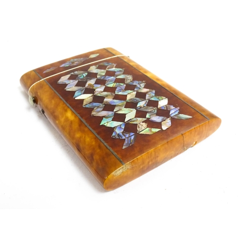 1187 - A Victorian tortoiseshell card case of rectangular form with inlaid abalone geometric decoration. Ap... 