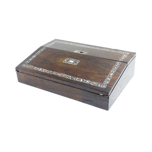 1190 - A late 19th / early 20thC rosewood writing slope with mother of pearl floral and foliate decoration,... 