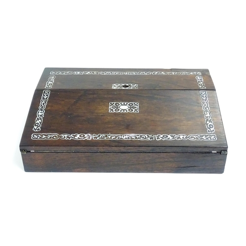 1190 - A late 19th / early 20thC rosewood writing slope with mother of pearl floral and foliate decoration,... 