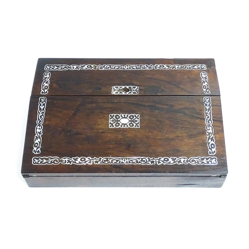 1190 - A late 19th / early 20thC rosewood writing slope with mother of pearl floral and foliate decoration,... 