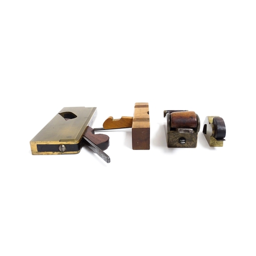 1201 - Four miniature woodworking / carpentry plane tools , comprising a Victorian brass chariot plane with... 