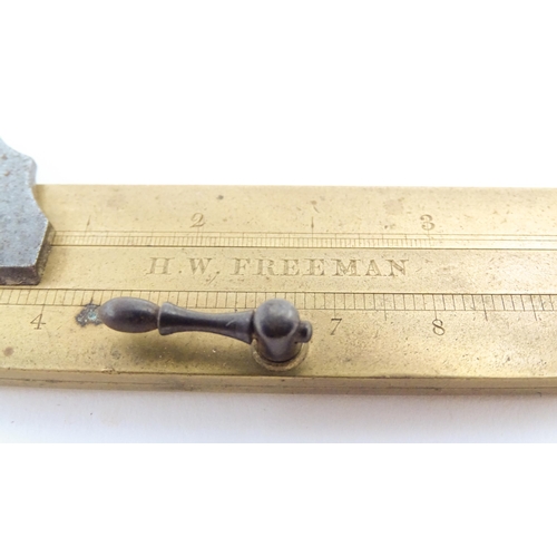 1203 - A 20thC brass calliper / gauge, engraved H. W. Freeman. Approx. 5