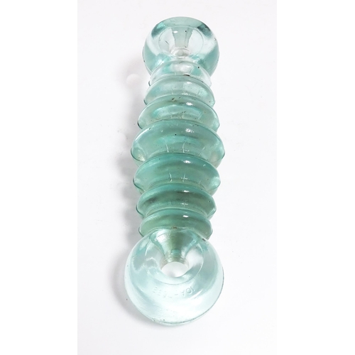 1205 - A 20thC glass radio strain insulator marked 10A - 7652. Approx. 7