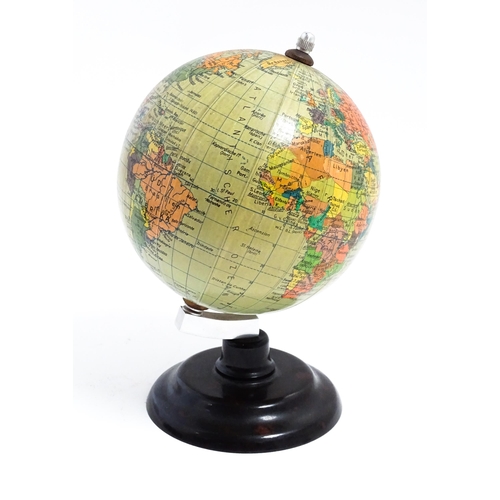 1211 - A small 20thC German desk globe by Politischer Erdglobus, on a Bakelite stand. Approx. 7 1/2