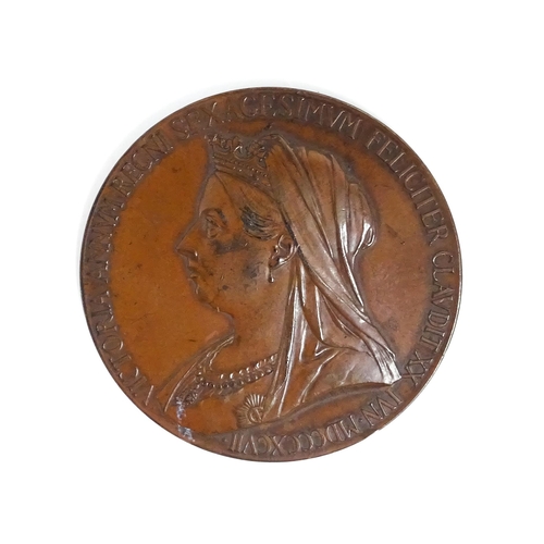 1225 - A 19thC bronze medallion celebrating the Diamond Jubilee of Queen Victoria 1897. Approx. 2 1/4