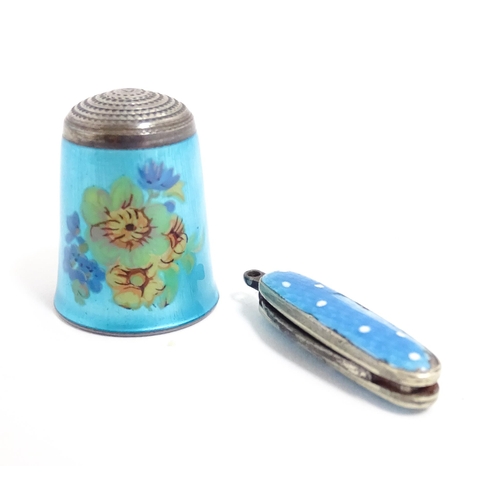 1228 - A silver thimble with turquoise guilloche enamel decoration, hallmarked Birmingham 1983, maker James... 