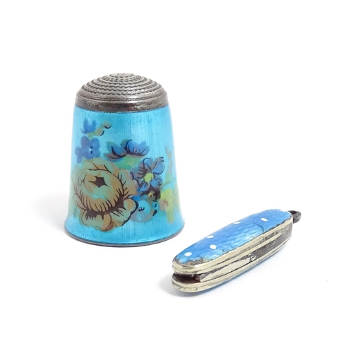 1228 - A silver thimble with turquoise guilloche enamel decoration, hallmarked Birmingham 1983, maker James... 