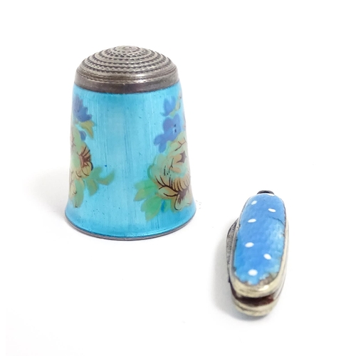 1228 - A silver thimble with turquoise guilloche enamel decoration, hallmarked Birmingham 1983, maker James... 