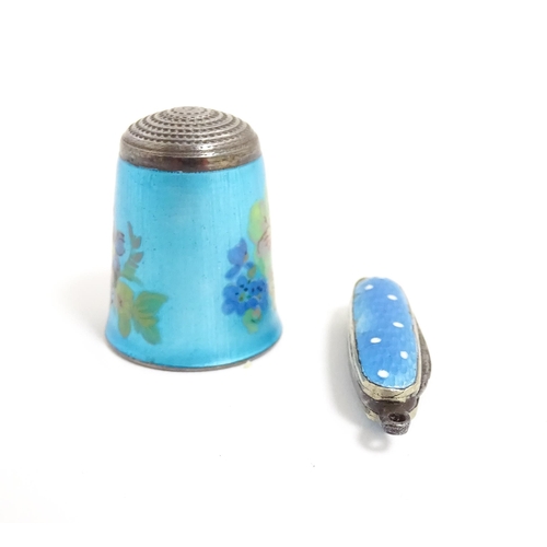 1228 - A silver thimble with turquoise guilloche enamel decoration, hallmarked Birmingham 1983, maker James... 