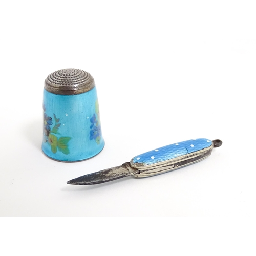 1228 - A silver thimble with turquoise guilloche enamel decoration, hallmarked Birmingham 1983, maker James... 