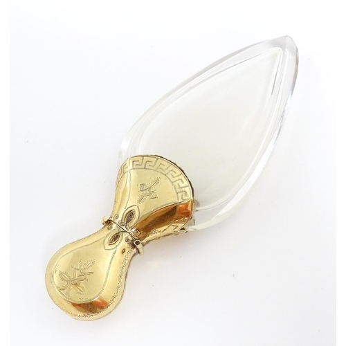 1229 - A 19thC glass scent bottle of teardrop form with Continental silver gilt mounts and hinged lid with ... 