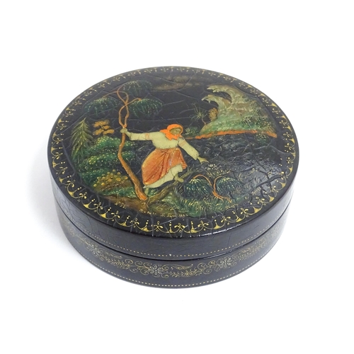 1230 - An early 20thC Russian pot and cover of circular form with hand painted decoration depicting a woman... 