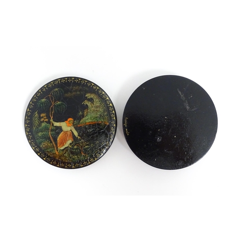 1230 - An early 20thC Russian pot and cover of circular form with hand painted decoration depicting a woman... 