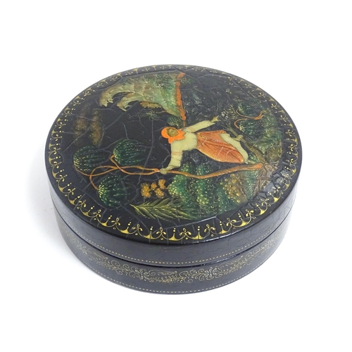 1230 - An early 20thC Russian pot and cover of circular form with hand painted decoration depicting a woman... 