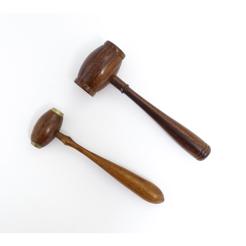 1240 - A 20thC treen turned wooden gavel with banded detail to handle. Together another with brass detail t... 