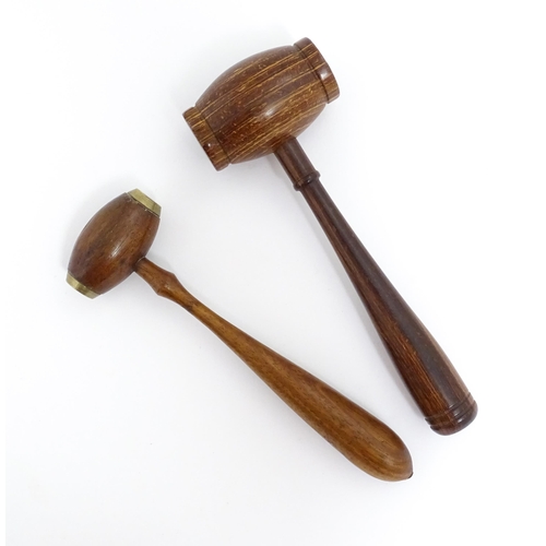 1240 - A 20thC treen turned wooden gavel with banded detail to handle. Together another with brass detail t... 