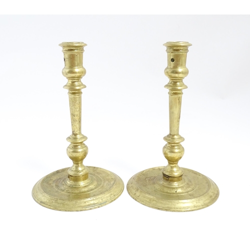 1249 - A pair of 20thC American brass candlesticks by Virginia Metalcrafters for Williamsburg Restoration. ... 