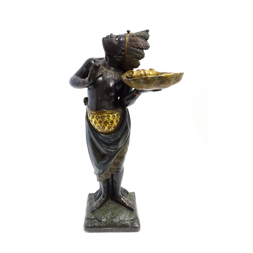 1270 - A 19thC carved and painted figural dumb waiter modelled as a female Blackamoor with feather headdres... 