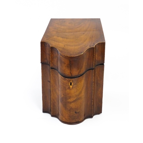 1272 - A 19thC mahogany knife box with serpentine front, satinwood stringing, opening to reveal cutlery div... 