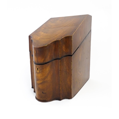 1272 - A 19thC mahogany knife box with serpentine front, satinwood stringing, opening to reveal cutlery div... 