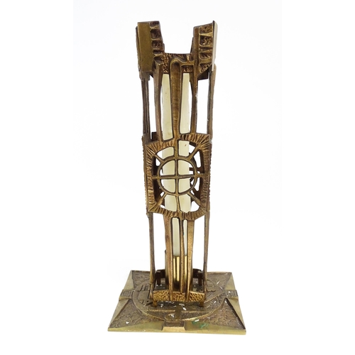 1273 - A large 20thC cast brass Modernist ecclesiastical / altar candlestick of abstract form, the base dec... 