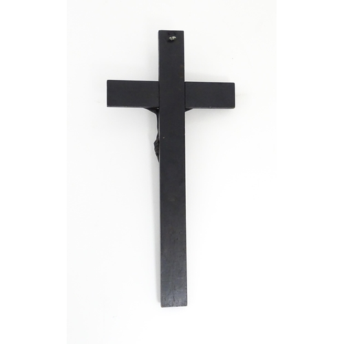 1275 - A 19thC ebonised crucifix with applied cast Christ / Corpus Christi. Approx. 16