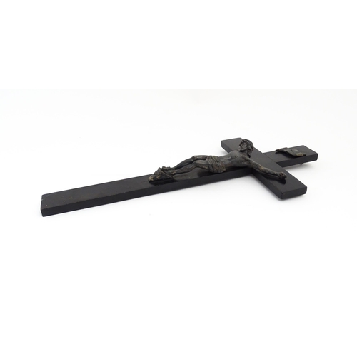 1275 - A 19thC ebonised crucifix with applied cast Christ / Corpus Christi. Approx. 16