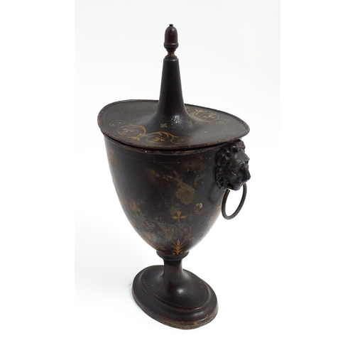 1276 - A 19thC toleware chestnut urn and cover with twin lion mask and ring handles, the simulated rosewood... 