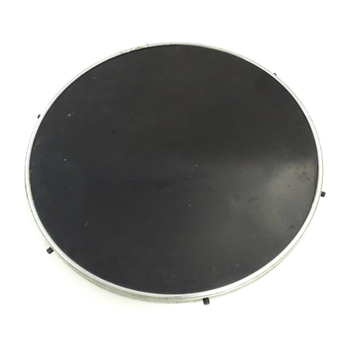 1293 - A 20thC retro lazy susan style turntable / table centre with black formica top. Approx 22